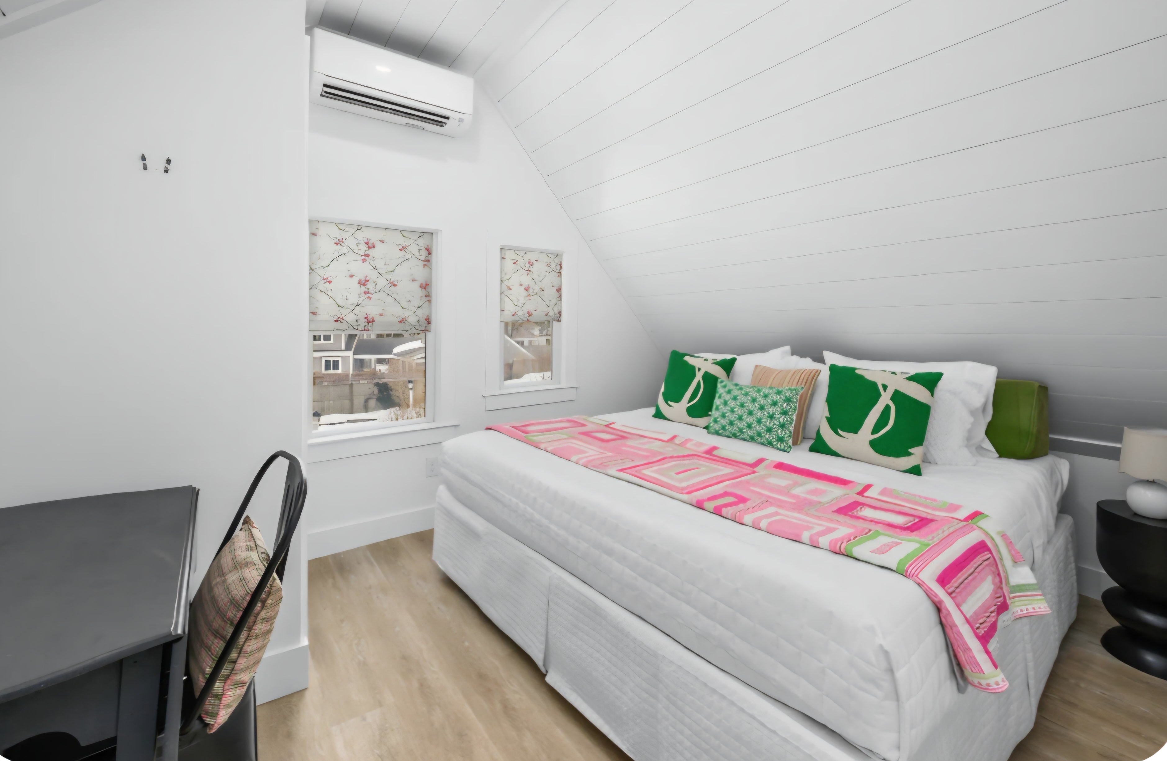 Cape Coddage king bedroom with shiplap ceiling