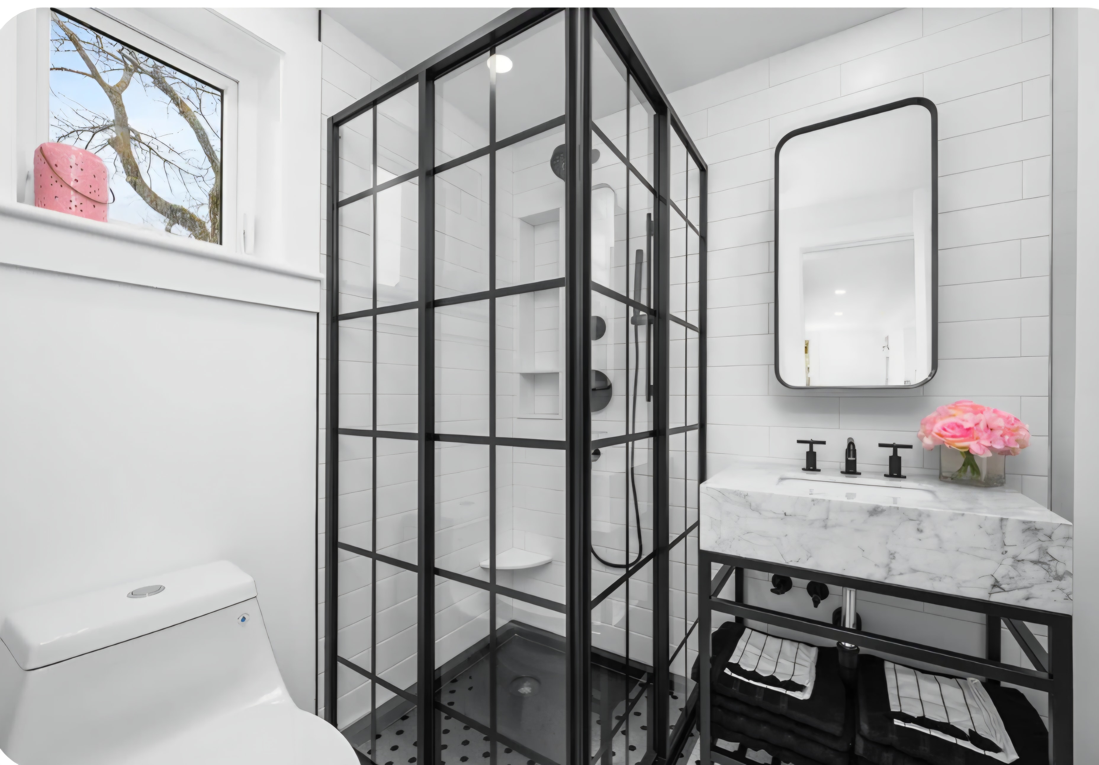 Cape Coddage marble bathroom with Kohler Purist fixtures and glass shower