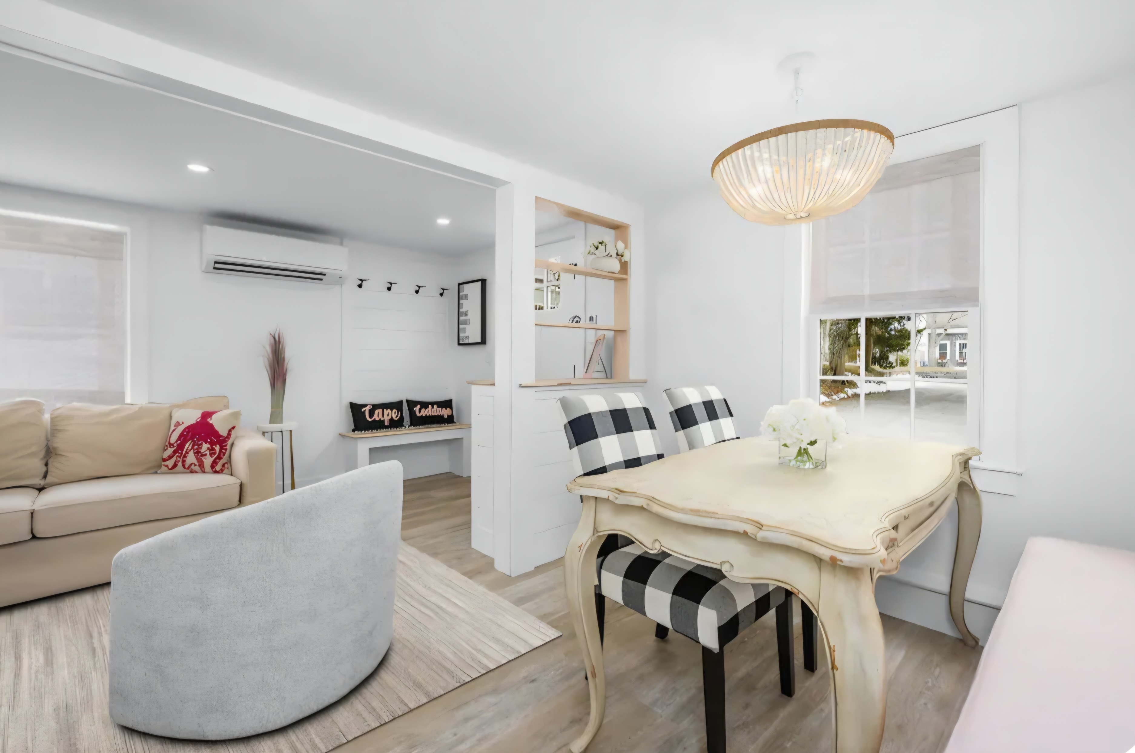 Cape Coddage dining area with vintage table and plaid chairs
