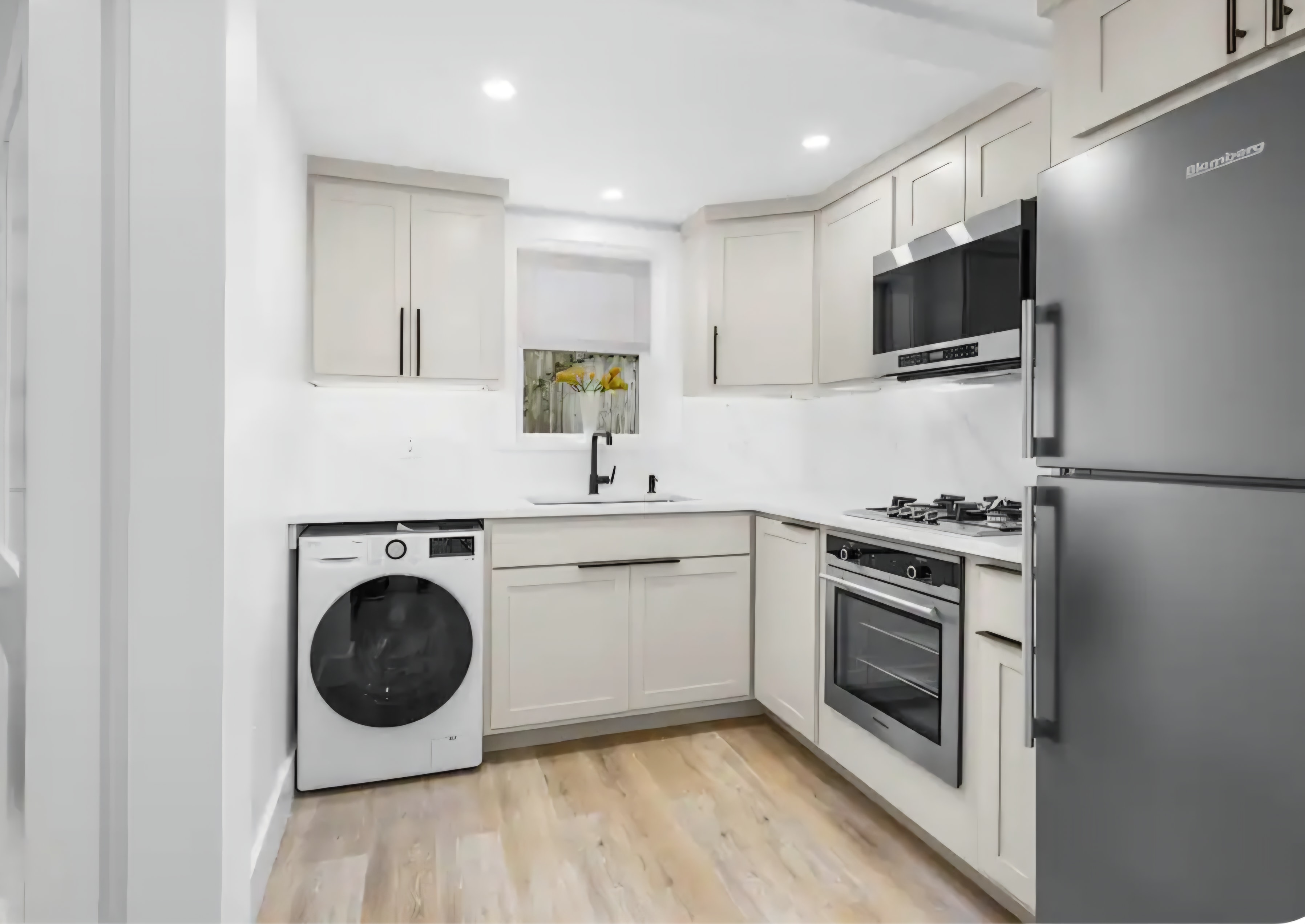 Cape Coddage renovated cashmere kitchen with quartz countertops