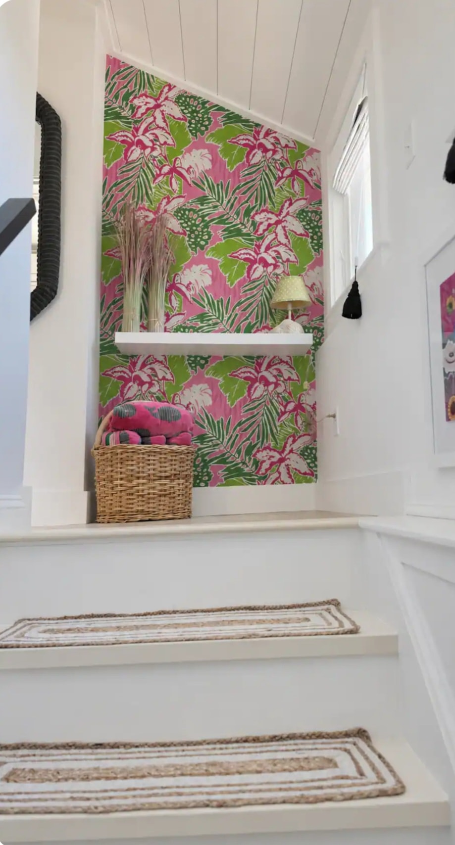 Cape Coddage staircase with bold pink and green tropical wallpaper